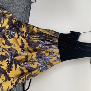 Theia velvet top metallic bottom ball gown